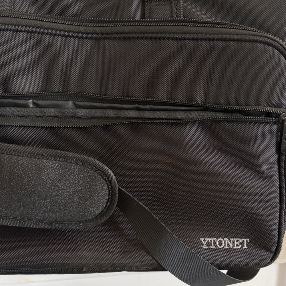 Laptop bag. Black, 17 inch adjustable strap multi-pocket like brand new!